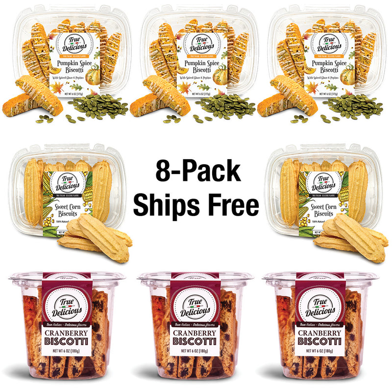 ["Eight True Delicious \"Bundle of the Month\" non-GMO cookies are arranged in two rows: pumpkin spice and sweet corn flavors on top, cranberry biscottis below. Center text reads: 8-Pack Ships Free."]